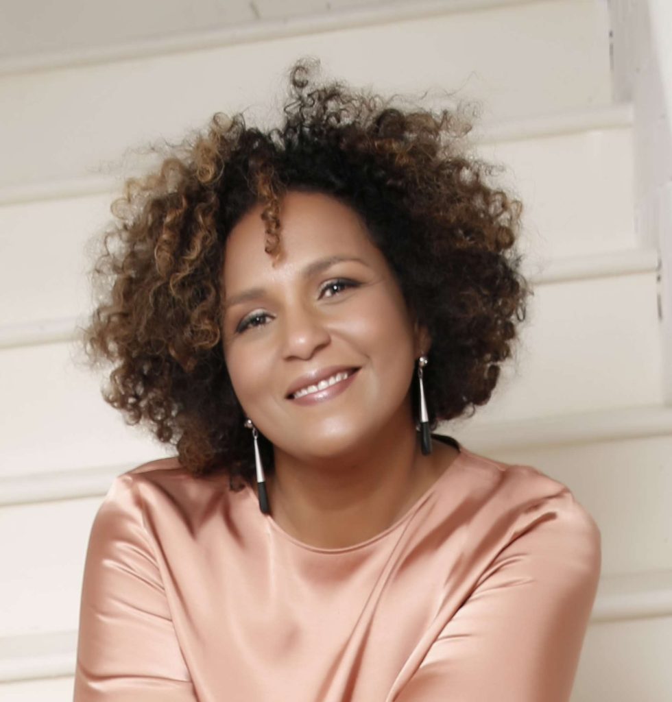 Smiling woman with curly hair